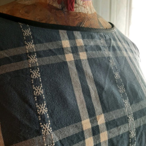 Women's blouse with long sleeve and back zipper used, size S