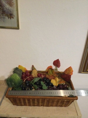 Basket with fake grapes like new
