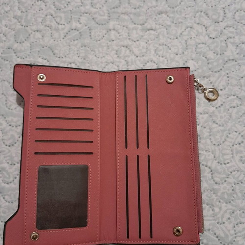 Pink wallet like new with few marks on front