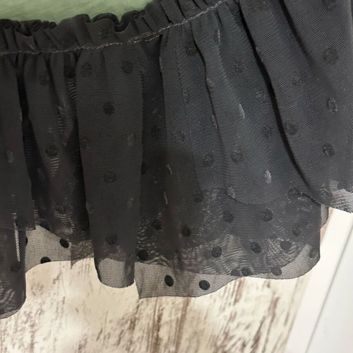 Asymmetric blouse made to order with Donatella details in black and green