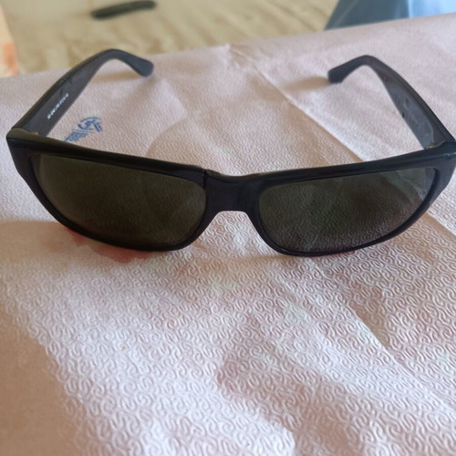 Ridley men's sunglasses with green lenses, broken frame