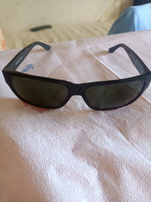 Ridley men's sunglasses with green lenses, broken frame