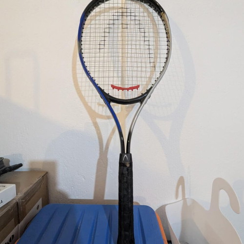 HEAD tennis racket with balls used