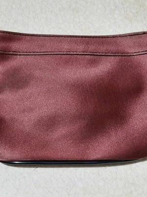 Estee Lauder toiletry bag new, burgundy color