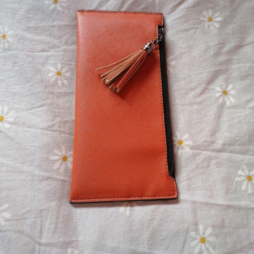 Orange wallet with six card slots and two bill compartments