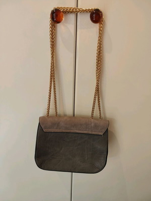 Evening shoulder bag like new with gold chain, two-tone