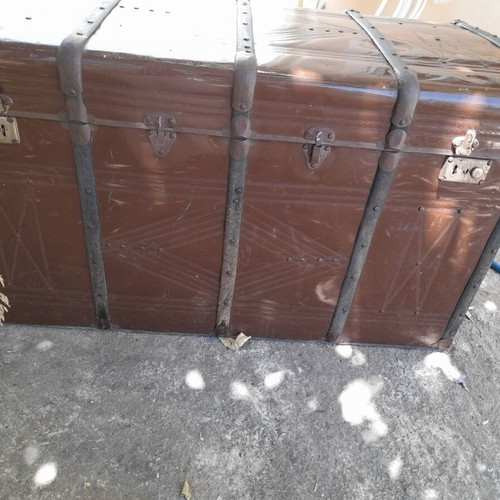 Large antique chest used with iron and wood design