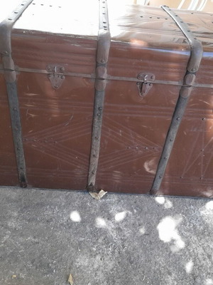 Large antique chest used with iron and wood design