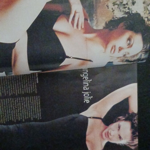 To Periodiko magazine September 2000 used with Angelina Jolie and Mario Fragkoulis