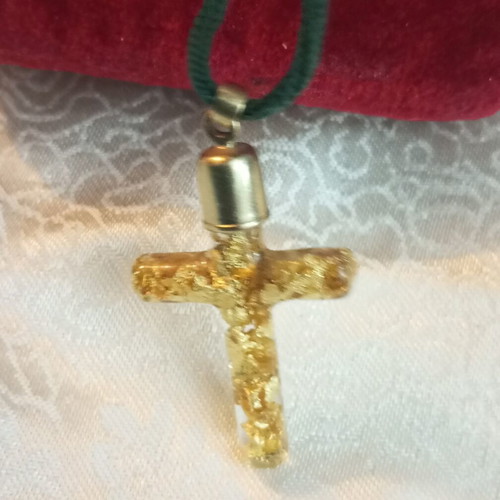 Cross with pure gold leafs in solution, metal