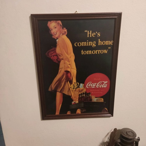 Coca Cola advertisement in wooden frame used