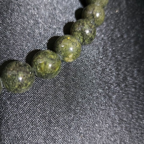 Decorative worry beads from semi-precious spiral stone