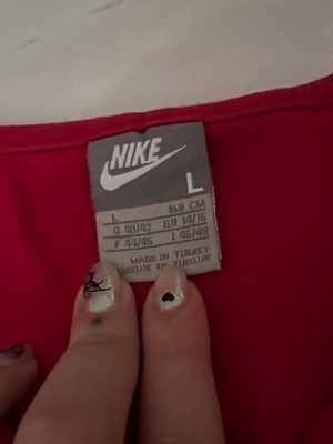 Nike women's short-sleeve shirt L like new, red