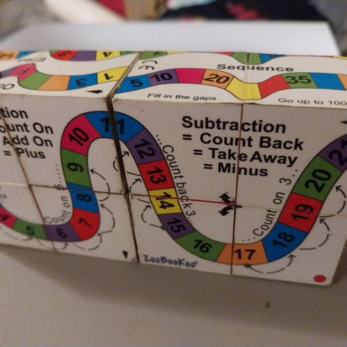ZooBooKoo foldable educational cube book used for addition and subtraction