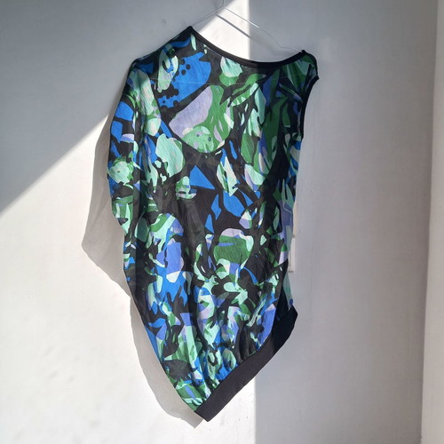 Asymmetric transparent blouse with blue-green print