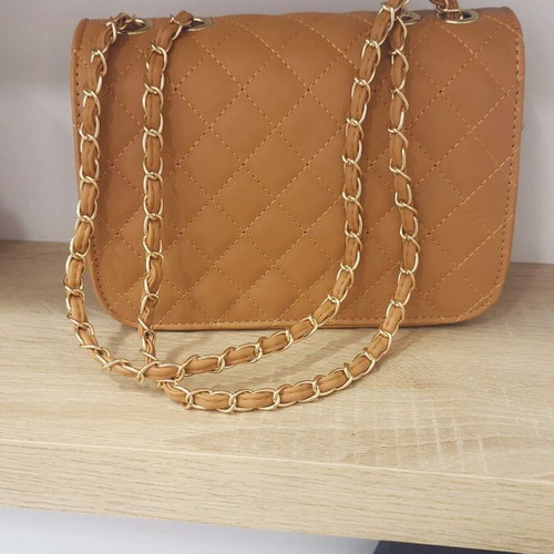 Shoulder bag new with gold details orange