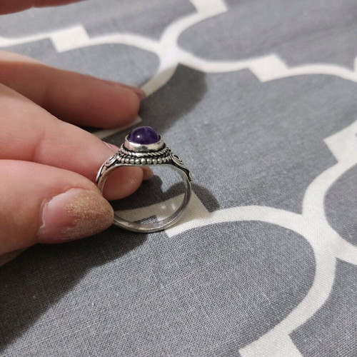 Ring with purple stone like new