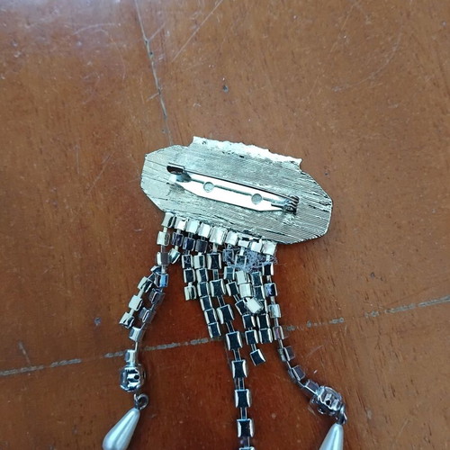 Brooch with stones like new, gray