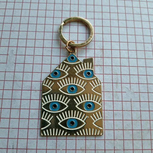 Keychain charm "mati" like new, metal with blue eyes
