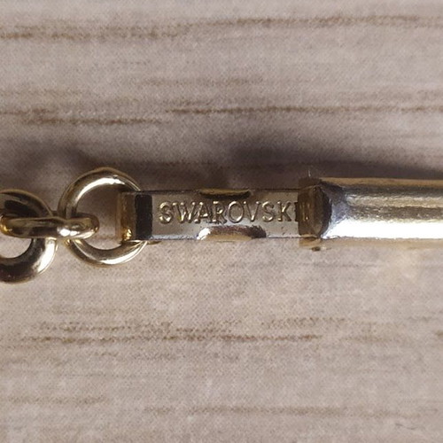 Swarovski bracelet like new, gold tone with crystals