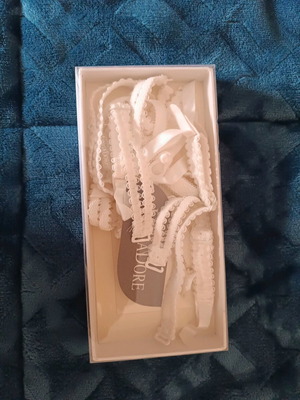 White garters new with tag