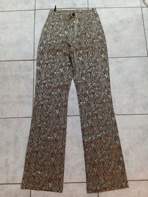 Patterned pants size S with gold designs