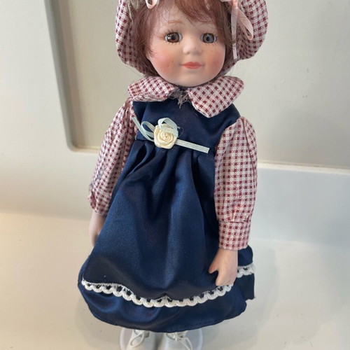 BC porcelain dolls like new, set of 2 pieces