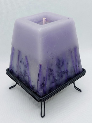 Decorative purple lavender candle with metal base