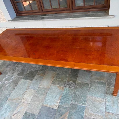 Solid wood dining table with decorative border and square legs