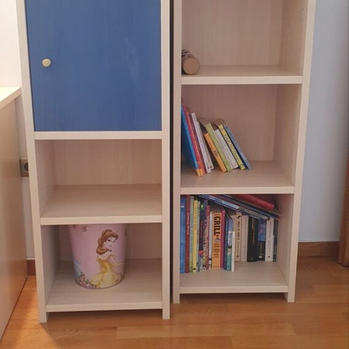 Blue bedroom set with desk, bookshelves and bed