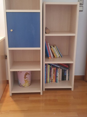Blue bedroom set with desk, bookshelves and bed