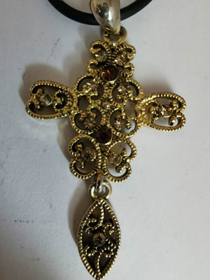 Vintage carved cross like new, gold tone with decorative stones