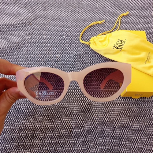 Beige sunglasses with case and box, Oriflame