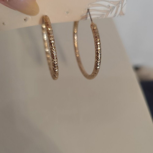 Earrings in gold color like new, medium size hoops
