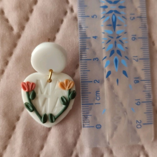 Heart-shaped earrings like new, plastic white and pink with flowers