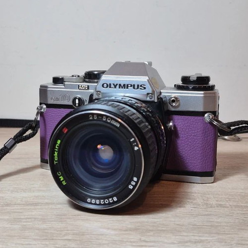 Olympus OM-10 αναλογική φωτογραφική μηχανή SLR 35mm μεταχειρισμένη με φακό Tokina RMC 28-50mm