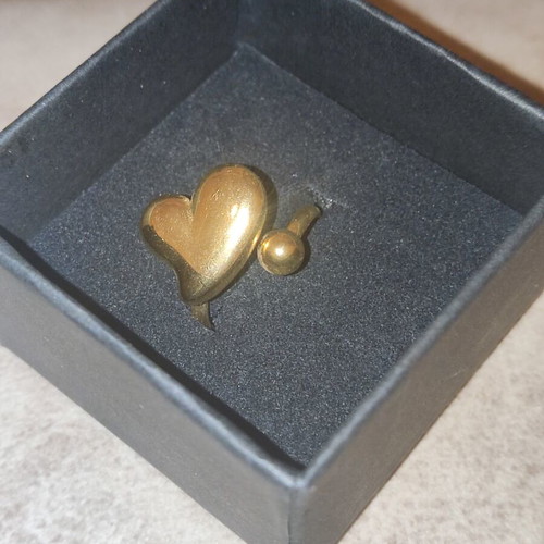 Steel ring new, gold color with double puffy heart design