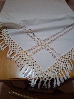 Traditional handwoven tablecloth with macrame and openwork