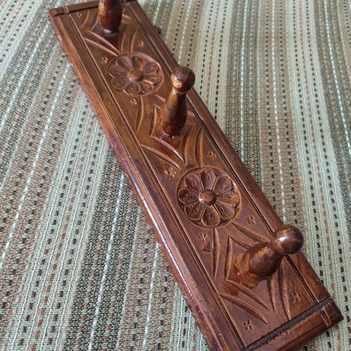 Vintage carved wooden coat rack with three hooks