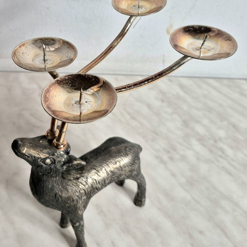 Vintage metal deer-shaped candle holder used