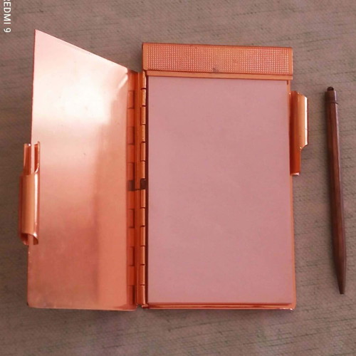 Vintage metal pocket notebook with integrated pencil used 1940-1950