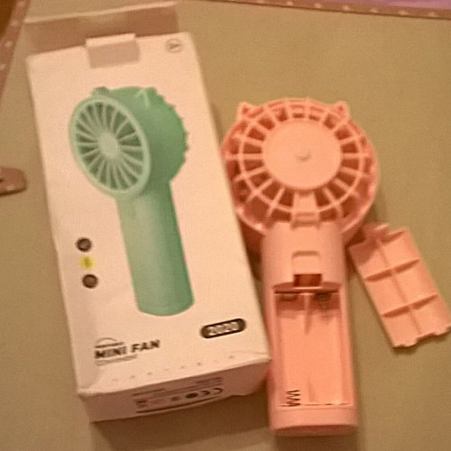 Pink Mini Fan like new with stable base, battery operated