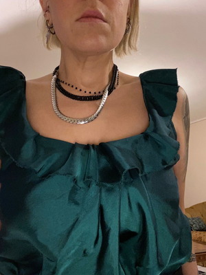 Satin blouse used emerald color size 44 with ruffles at neckline