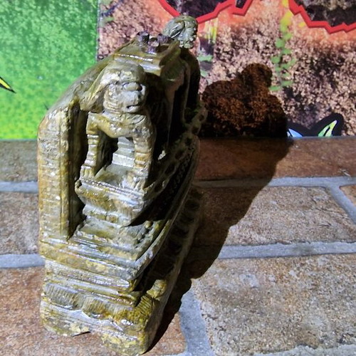 Antique carved stone decoration of Asian temple used
