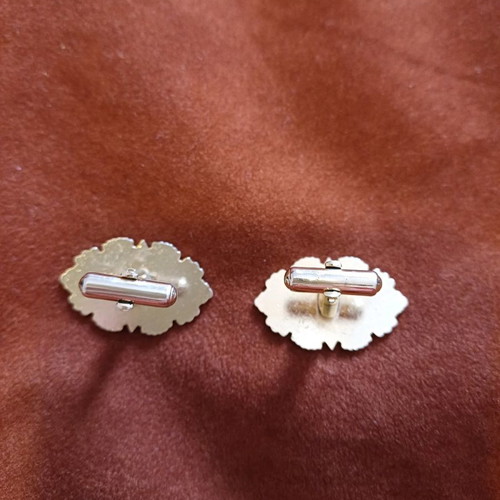 Orofix cufflinks used, vintage, embossed gold on coral background