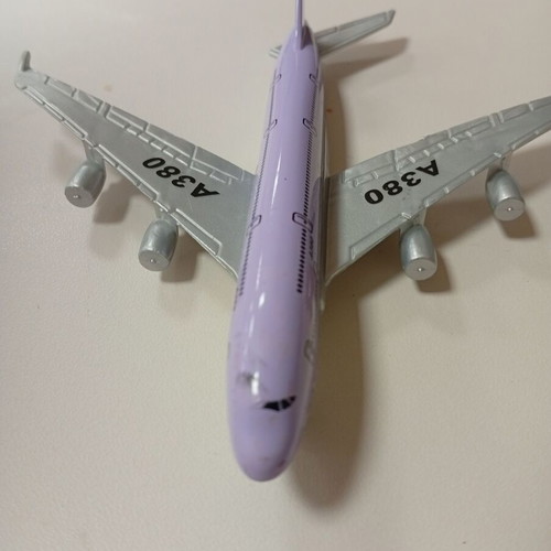 Small airplane miniature toy used