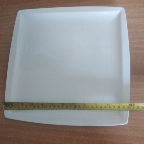 Porcelain serving platter like new 30x30 cm