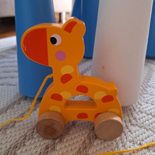Took Toys sliding giraffe toy used