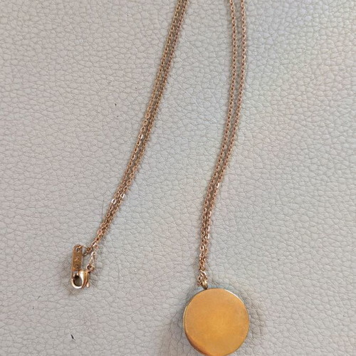 Gold necklace pendant with iridescent white stone, like new