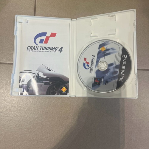 Grand Turismo 4 like new, complete in box